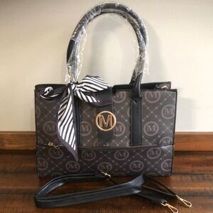 Elegant Black and Gray Satchel with Monogram Design